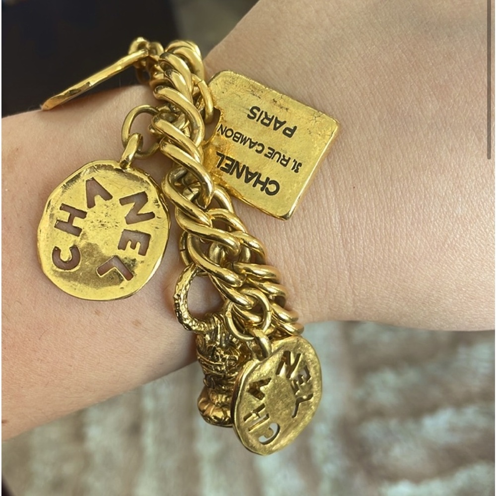 CHANEL VINTAGE GOLD Rare Charms Chain bracelet Retails: $2,900 Size: OS
